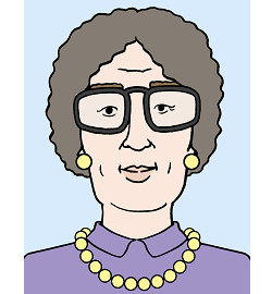 Eine Seniorin trägt graues, kurzes, gelocktes Haar und eine Brille. Sie trägt goldene Perlenohrringe und eine Perlenkette.