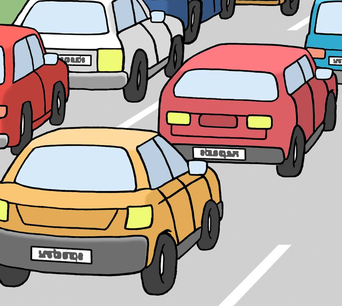 Autos die auf der Autobahn im Stau stehen.